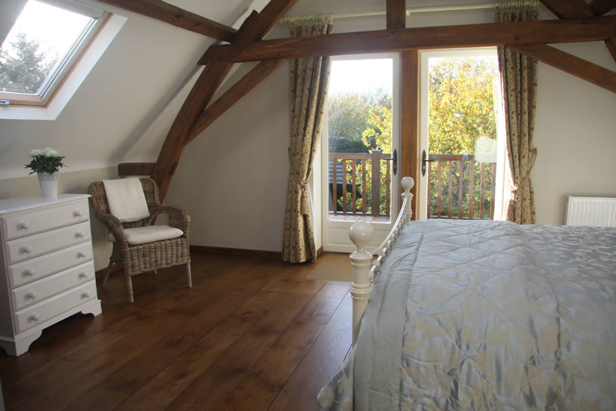 Sunset bedroom patio doors and chair